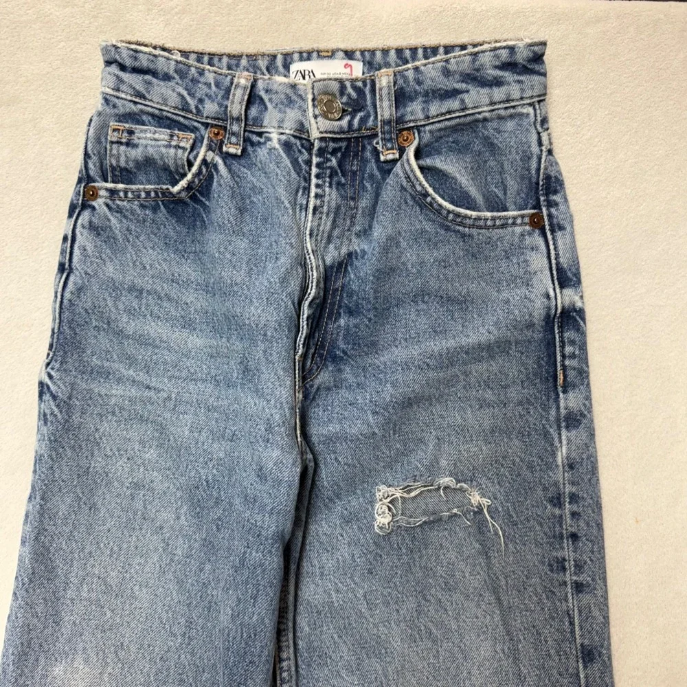 Zara High Waisted Wide Leg Distressed Jeans Light Wash Blue Size 0 24W